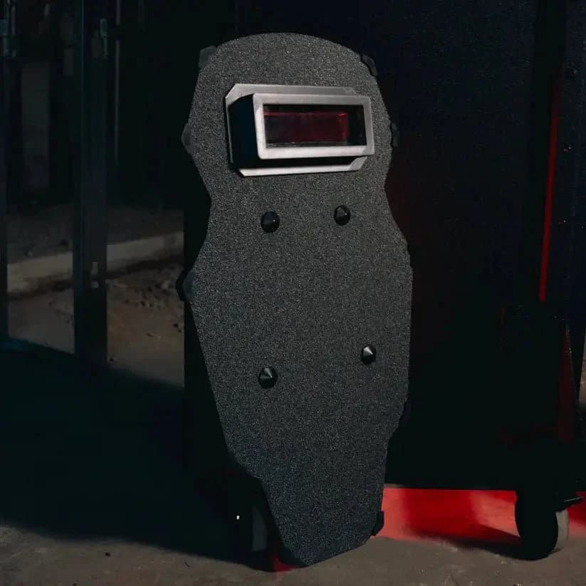 Multi-curve NIJ Level III+ ballistic shield with viewport